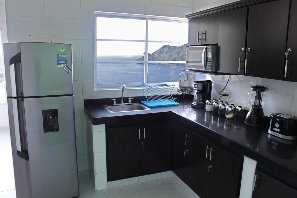 Suitehouse Taganga Bagian luar foto